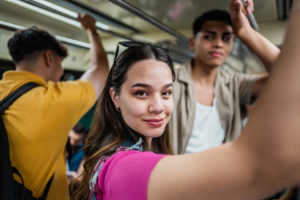 portrait of a young woman on the subway train